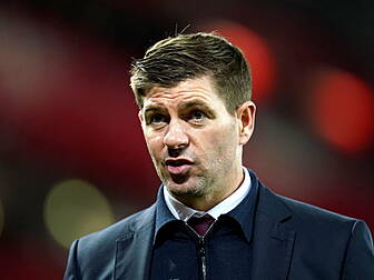 Steven Gerrard is having a hug...